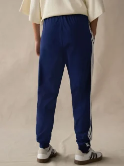 adidas Bleu - Essentials Survêtement à poignets 3Rayures|Femme Vêtements De Sport|Leggings Et Joggings