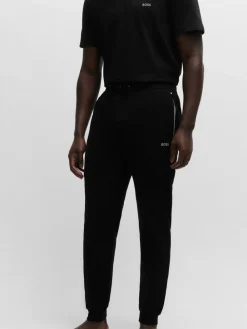 Online BOSS - Bas de survêtement en coton extensible Noir