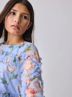 Baker by Ted Baker Robe bleue en maille à volants et imprimé fleuri| Robes|Tenues Grandes Occasions