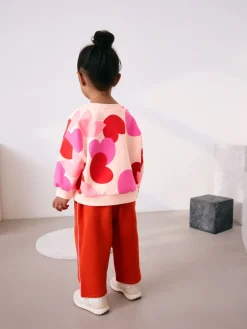 Best Next - Ensemble Sweat-shirt et jogging Coupe ballon (3mois -7ans) Rose/rouge motif cœurs